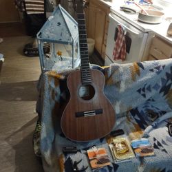 Aklo Guitar With A Blackstar Mini Amp And Thee Sets Of Of Guitar Strings And Strap
