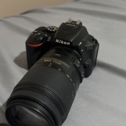nikon 5600  with charger , battery ,and sim card