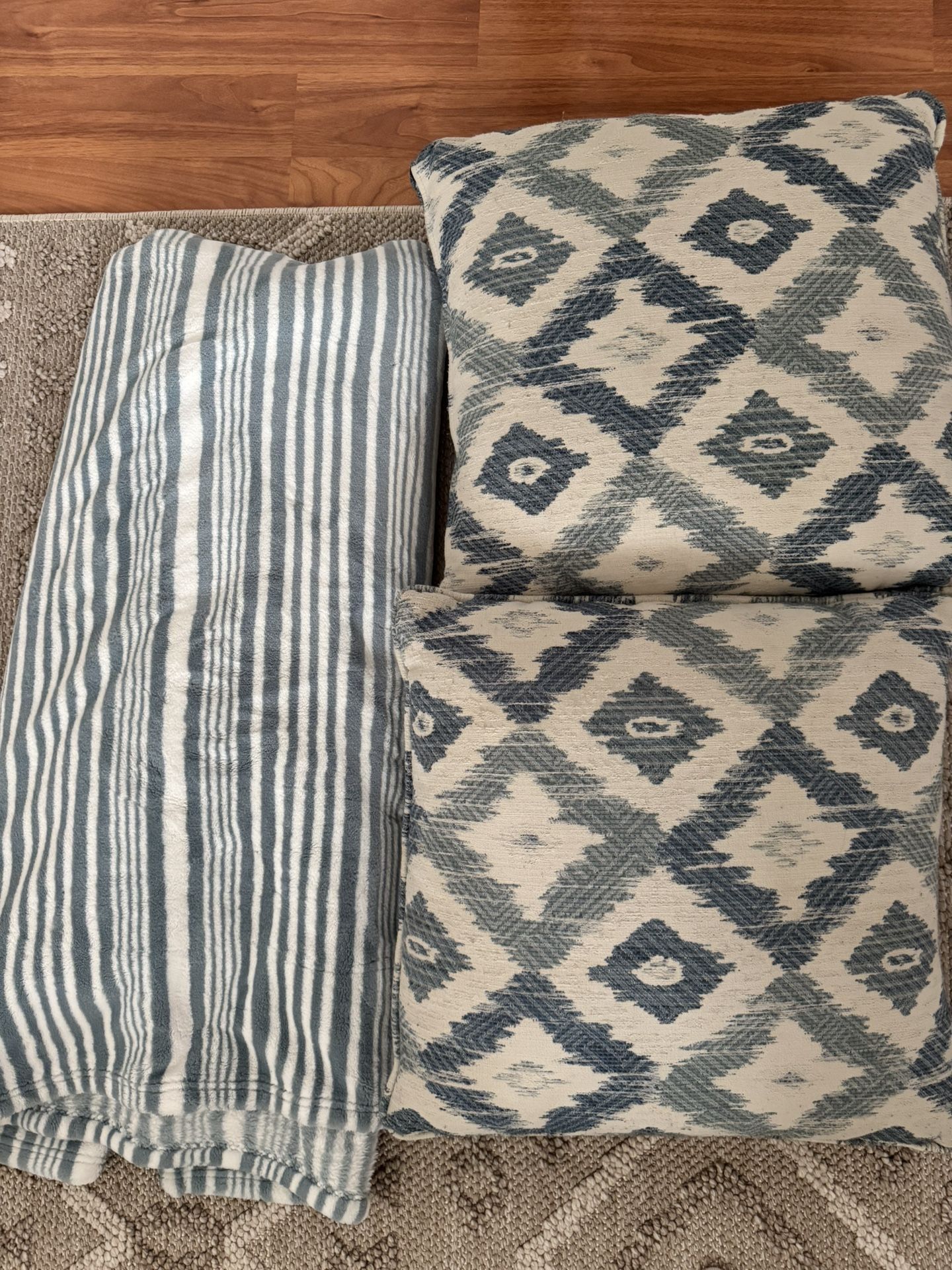 2 Pillows And throw blanket