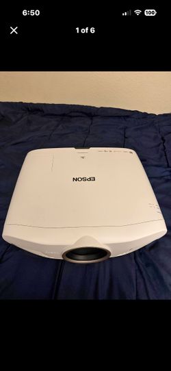 Epson 5040ube with Epson wireless HDMI Bridge.