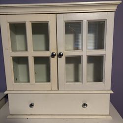Small table top curio cabinet
