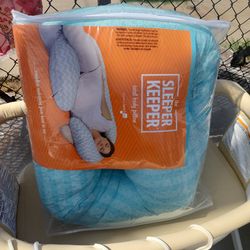 The sleeper keeper baby pillow/maternity