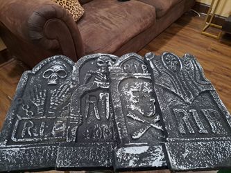 Set of 4 foam head  stones