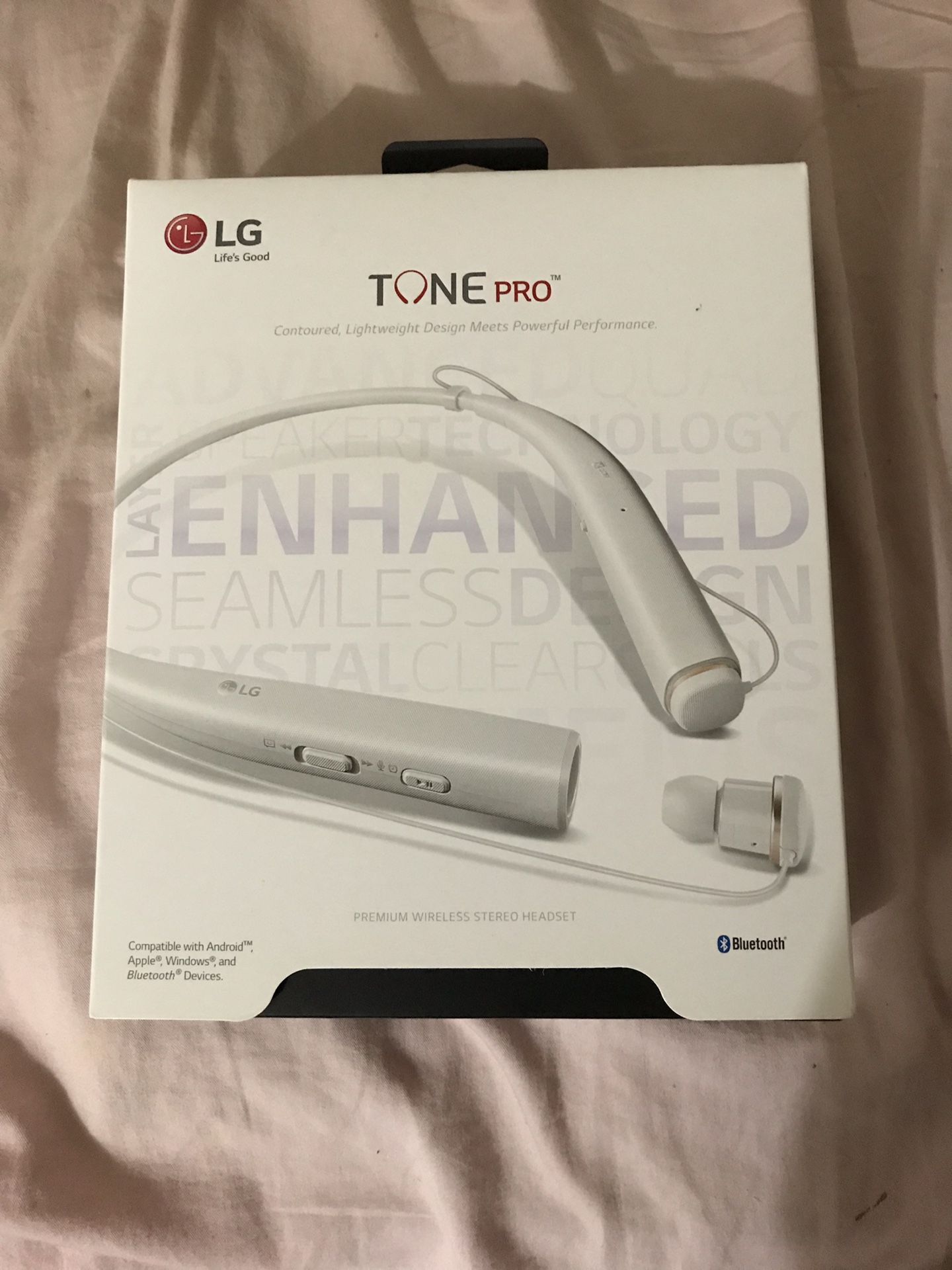 White LG tone pro headphones