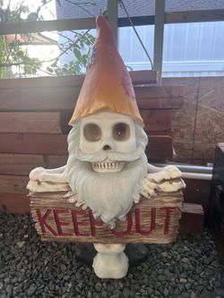 skeleton-themed garden gnome statue made of resin and hand-painted