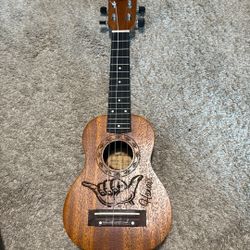 Ukulele, like new .