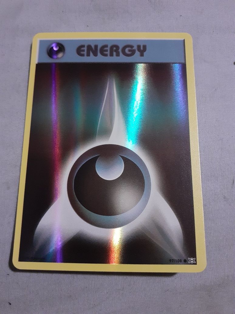 Holo pokemon energy card.