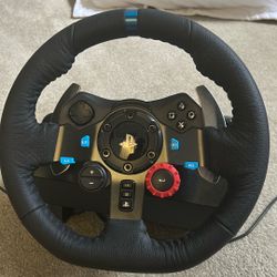 racing steering wheel and pedals
