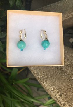 Turquoise clip on earrings.