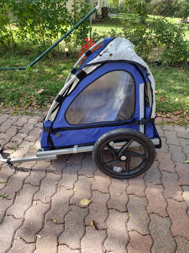 Pre-owned.   INSTEP Bike Trailer Double Seat 2 In I. Convoy Carrier. Blue- Gray. 