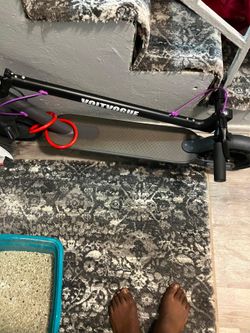 VOLTVOGUE folding electric scooter.