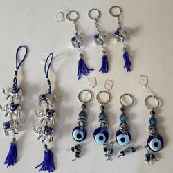 Turkish Evil Eye charms, keychains, elephant symbols, blue tassels, Amuletos ojo turco, llaveros, símbolos de elefante azul 