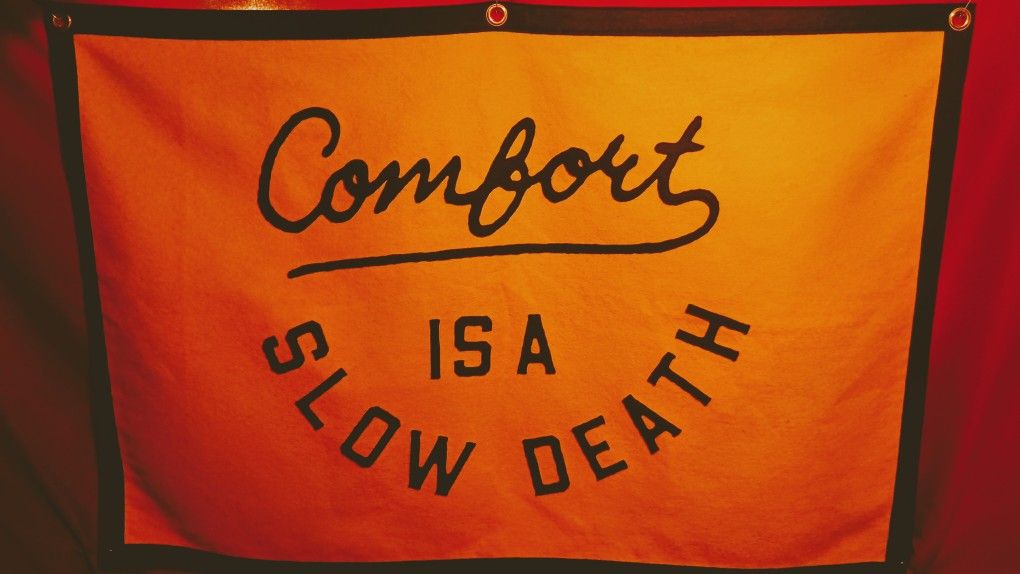 Comfort is a Slow Death Championship Banner
