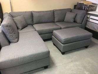 BRAND NEW REVERSIBLE SECTIONAL SOFA WITH FREE OTTOMAN