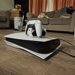 Sony ps5 with 1 controller and charging station(comes with cords and original box if wanted)