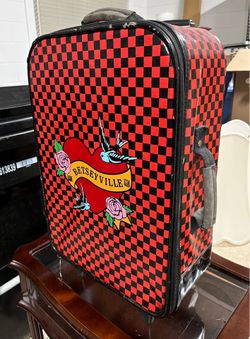 Vintage Betsyville carry-on luggage with checkered Betsy Johnson tattoo style design