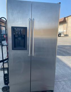 GE  Side-by-Side Stainless Steel Refrigerator
