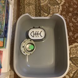 New cat litter and portion control cat bowl never usedVery large 