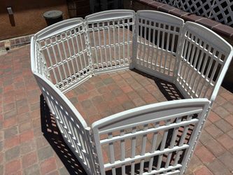 White plastic playpen