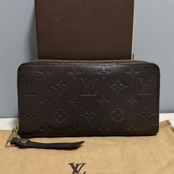 LOUIS VUITTON Empreinte Zippy Wallet Tourterelle