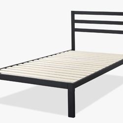 Full size bed, mattress, box springs.