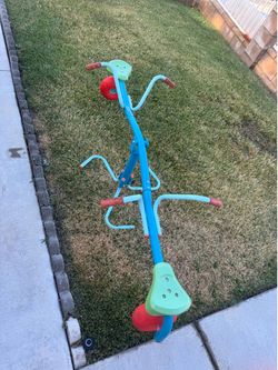 Kids spinning see saw