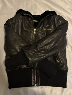 Baby Phat leather bomber jacket with a faux fur-lined hood