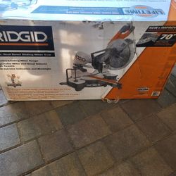 RIDGID 12"DUAL BEVEL SLAITYNNG MITER SAW  100% NEW 