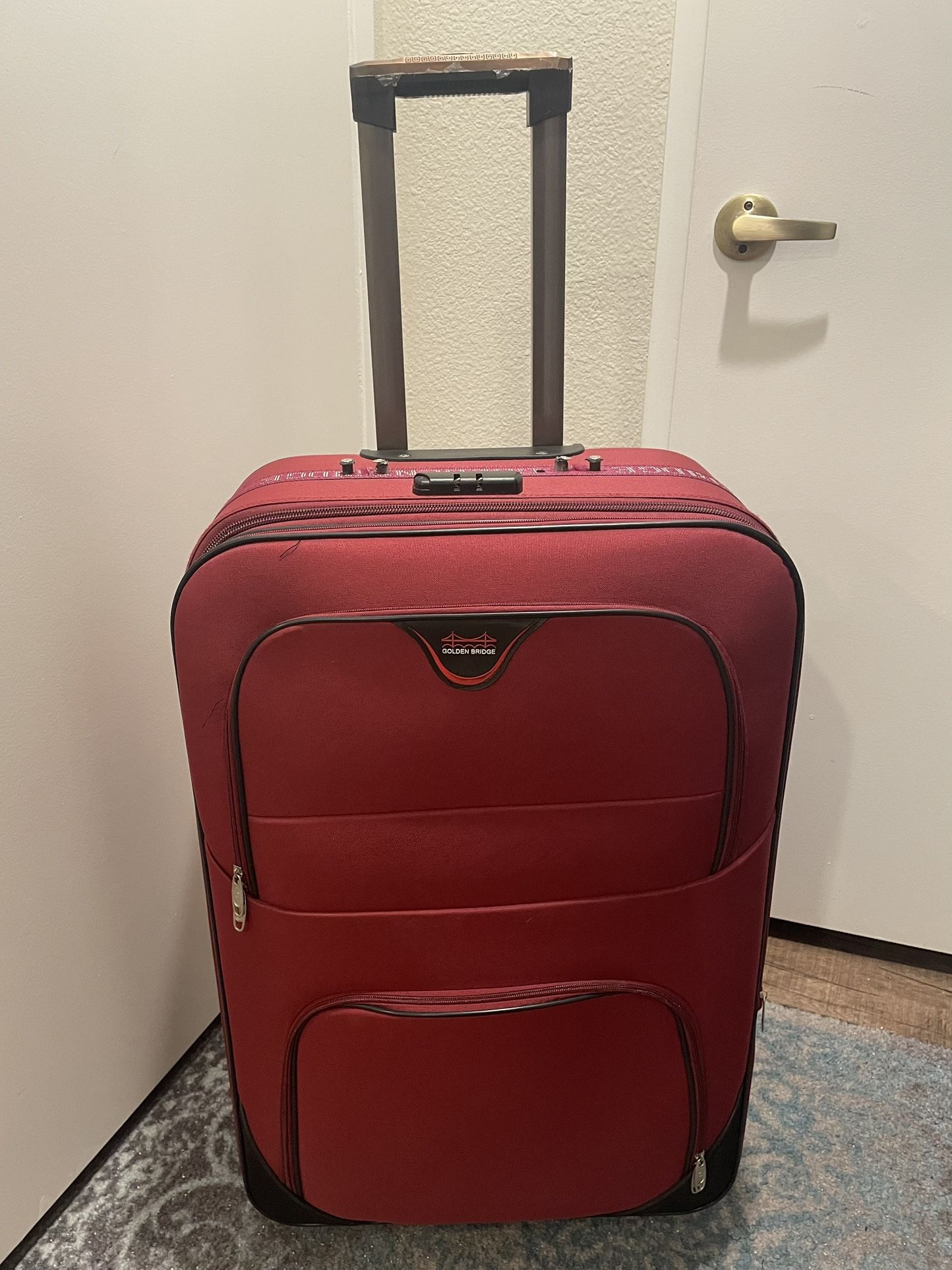 Red Suitcase Apx 29” X 19” X 12”