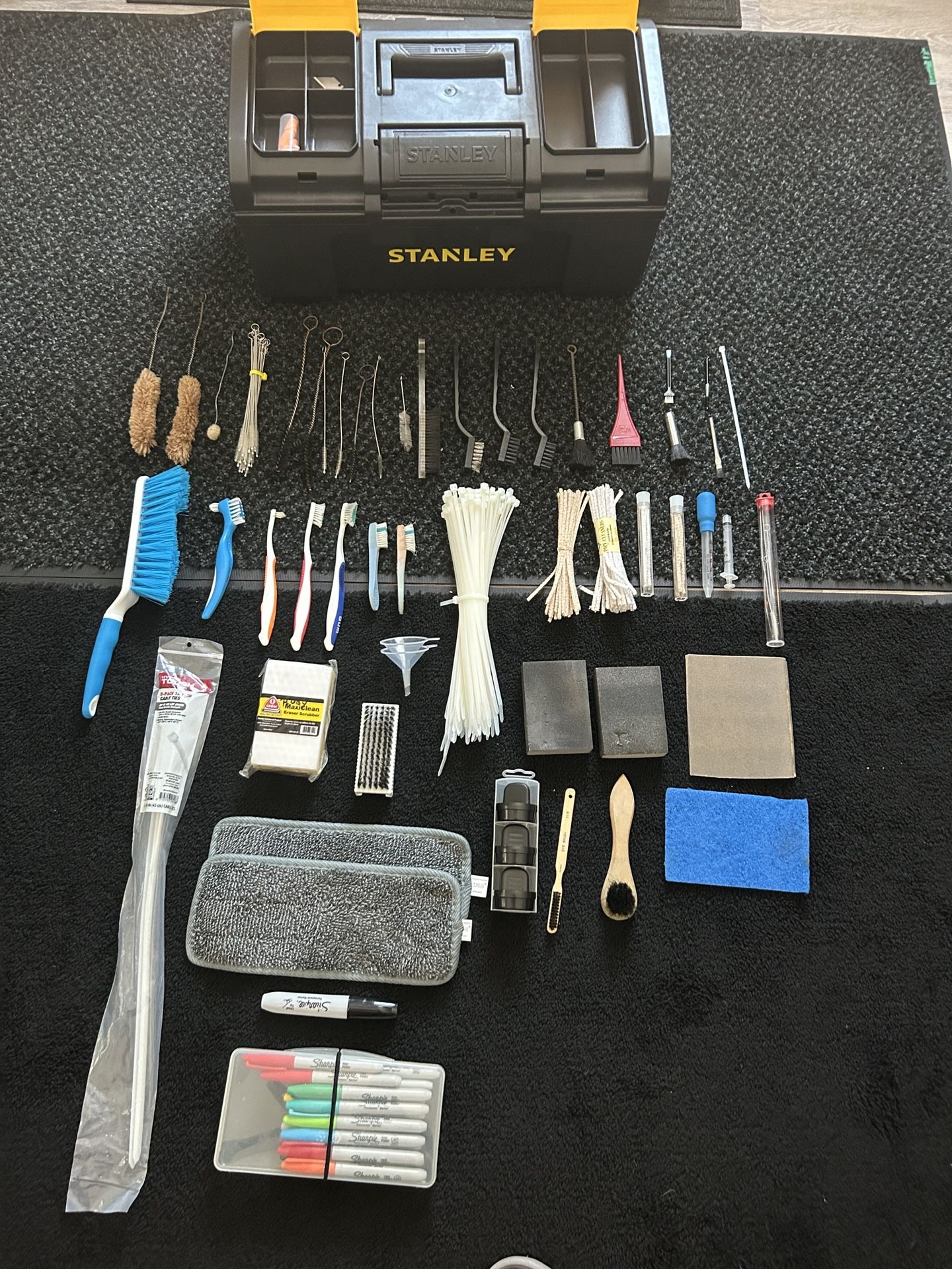 Assorted tools and Stanley container 