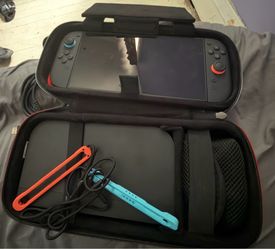 Switch 2 - Console w/ Travel Case and Games