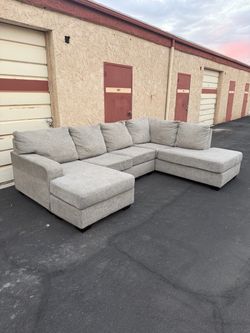 WITH DELIVERY gray sectional couch
