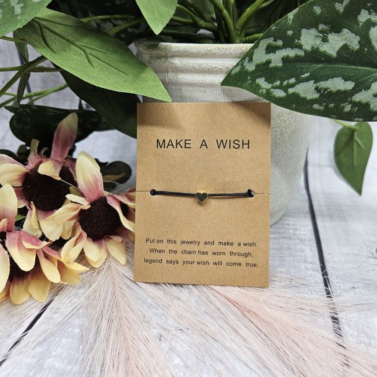 Make a wish gold heart dainty black silk cord adjustable bracelet put on the bracelet and make a wish when it is worn through legend says your wish wi