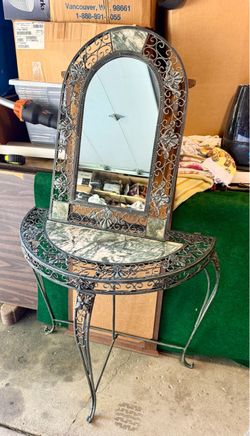 Metal and marble half table with matching mirror