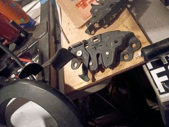 Murano hood latch