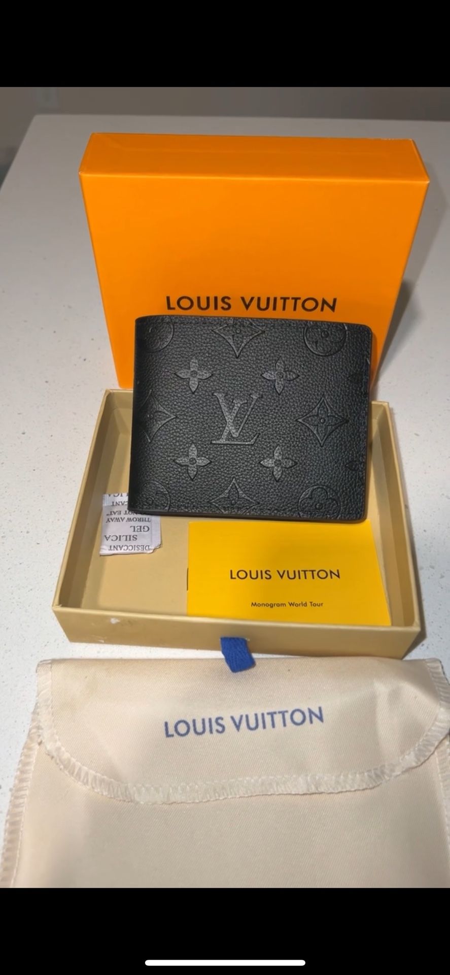 Louis Vuitton Multiple Wallet – Monogram Empreinte Leather in Black