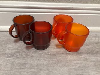 Tupperware brand Set of 4 Orange Red Glass Mugs. Negotiable