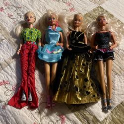Four Beautiful Barbies Excellent Used Condition