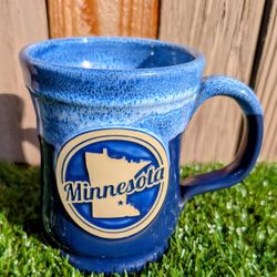 2018 "Minnesota" State Shaped Medallion, 14 ounces, Blue w/White Frosted Glaze (Deneen Pottery) Pepin Mug