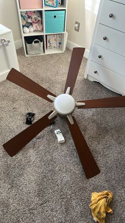 A 52 Inch Fan With Remote Control And Very Good Condition. Everything Works Just Upgrading.