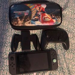Nintendo Switch with Pro Controller and Carrying Case