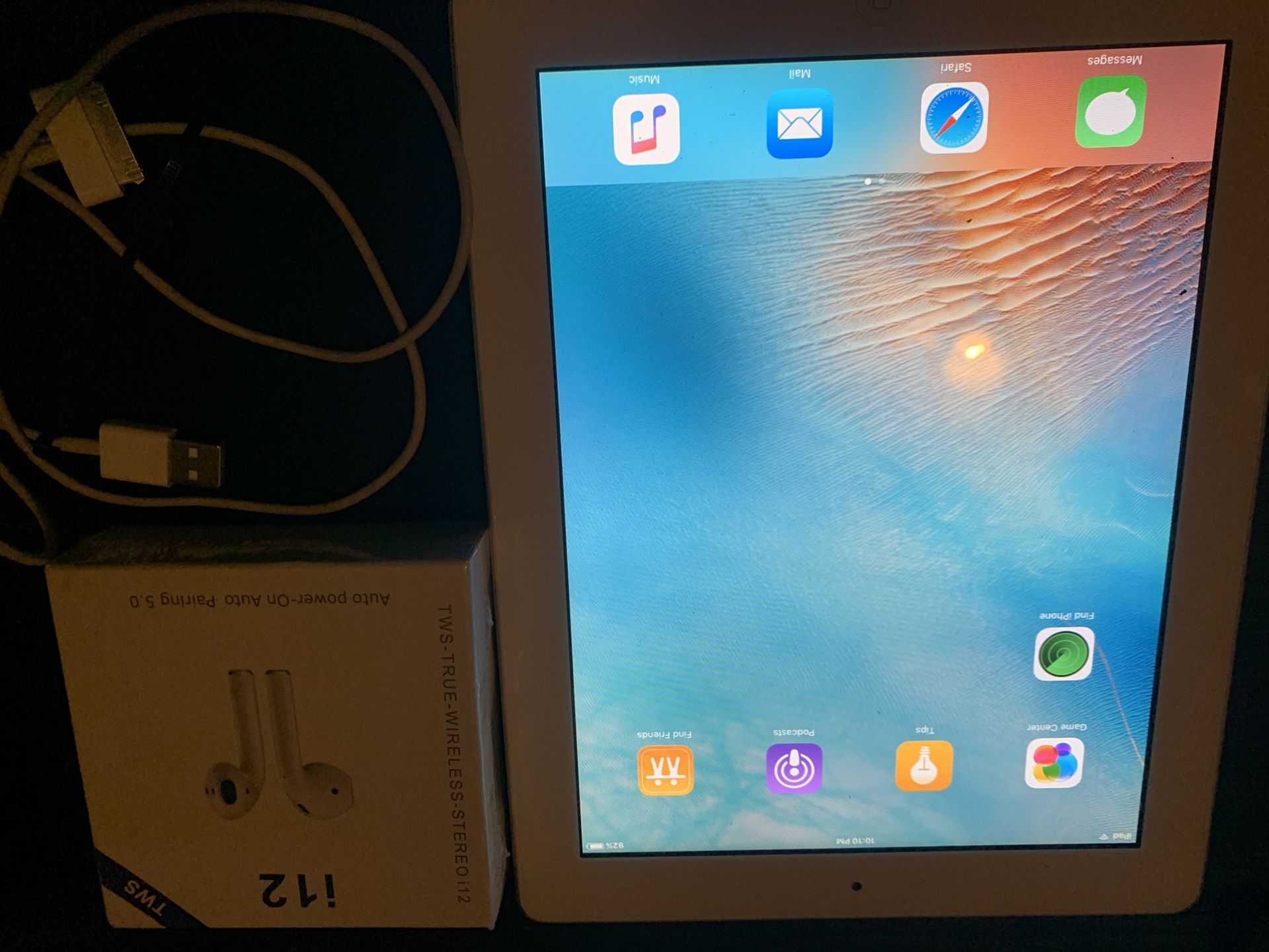 IPad w/ Wireless Earbuds & Apple TV Device 