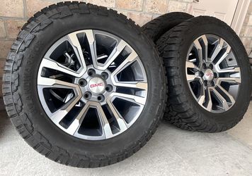 Gmc Denali 20s On 33s. New Wheels And Tires. Chevy Caps Available.