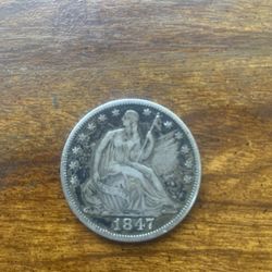 1847 Seated Liberty Half Dollar coin. 