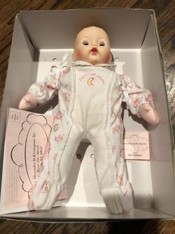 Retired Madame Alexander doll. Still in box.