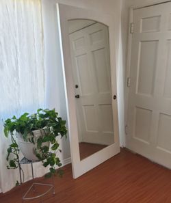 Large arched floor mirror