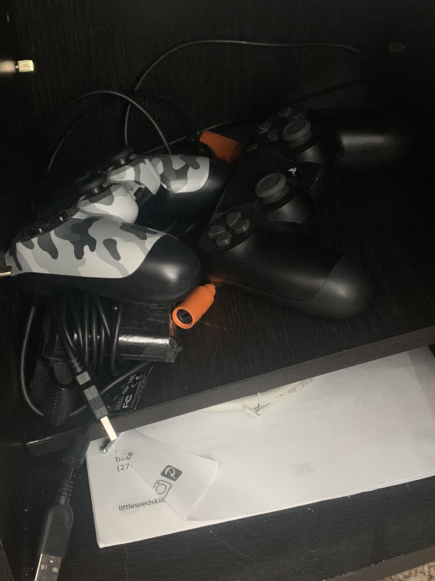 PlayStation 4 with all wires, 2 controllers, and 4 games