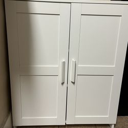 White Ikea Brimnes Cabinet with doors