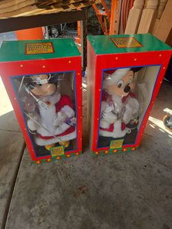 It's a small world holiday, nineteen ninety four, disney store, mini and mickey