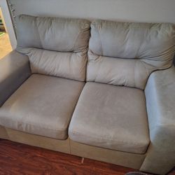 Reclining Sofa And A Loveseat